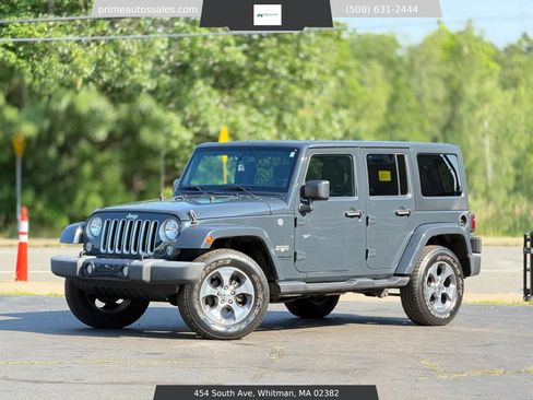 Used 2016 Jeep Wrangler Unlimited Sahara w/ Dual Top Group AWD/4WD image 29