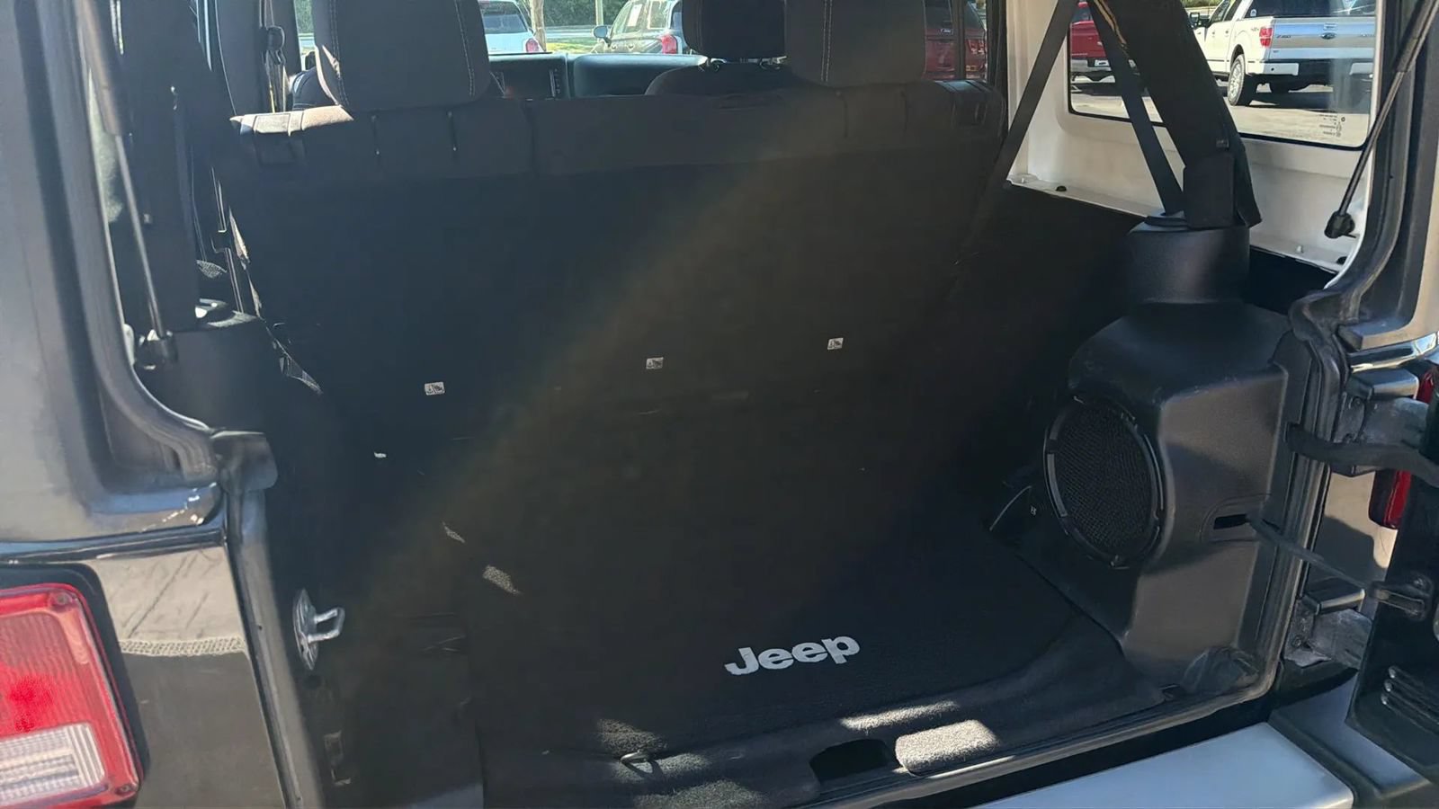 Used 2013 Jeep Wrangler Unlimited Sahara w/ Dual Top Group AWD/4WD image 16