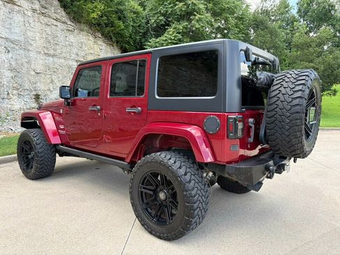 Used 2013 Jeep Wrangler Unlimited Sahara w/ Dual Top Group AWD/4WD image 13