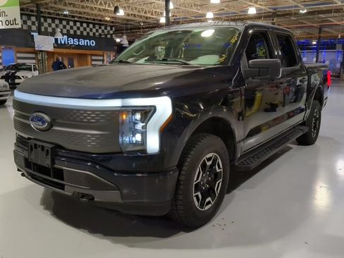 Used 2023 Ford F150 Lightning XLT AWD/4WD image 1