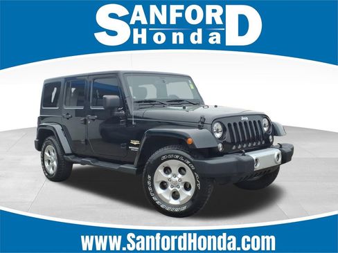 Used 2014 Jeep Wrangler Unlimited Sahara w/ Connectivity Group image 1