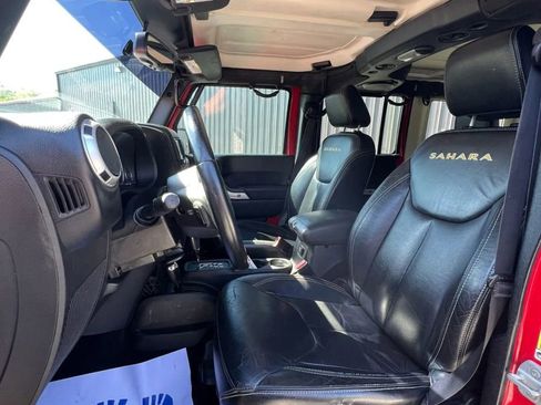 Used 2013 Jeep Wrangler Unlimited Sahara w/ Dual Top Group AWD/4WD image 9