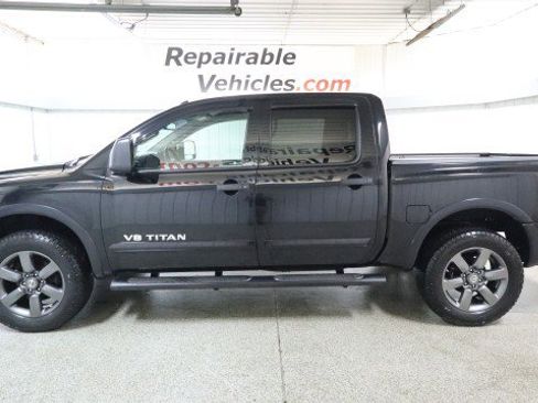 Used 2015 Nissan Titan SV w/ SV Value Truck Package AWD/4WD image 1