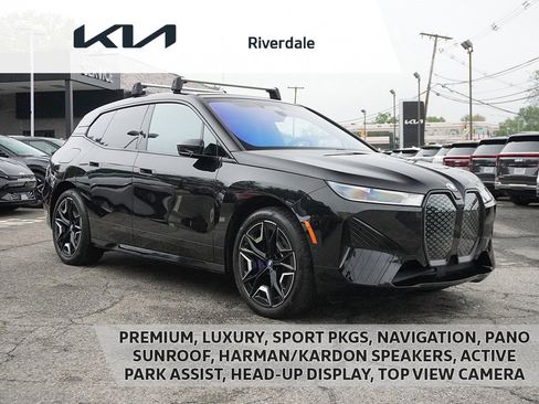 Used 2024 BMW iX xDrive50 w/ Premium Package image 1