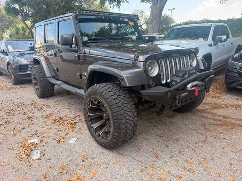Used 2016 Jeep Wrangler Unlimited Sahara w/ Max Tow Package AWD/4WD image 1