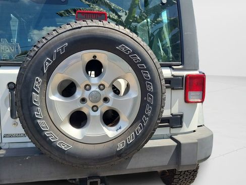 Used 2012 Jeep Wrangler Unlimited Sport w/ Max Tow Pkg AWD/4WD image 11