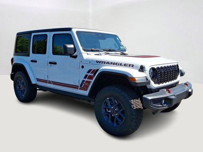 New 2026 Jeep Wrangler Unlimited Sport w/ Dual Top Group
