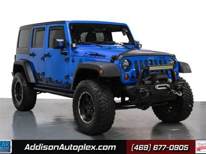 Used 2012 Jeep Wrangler Unlimited Rubicon w/ Dual Top Group