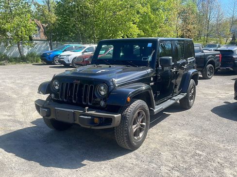 Used 2016 Jeep Wrangler Unlimited Sahara AWD/4WD image 1