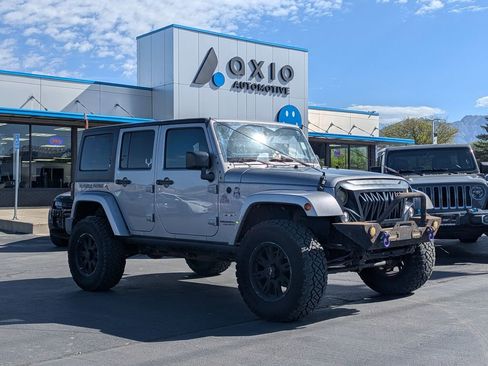 Used 2016 Jeep Wrangler Unlimited Sahara w/ Connectivity Group AWD/4WD image 1