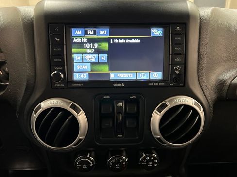 Used 2016 Jeep Wrangler Unlimited Sahara w/ Dual Top Group AWD/4WD image 24
