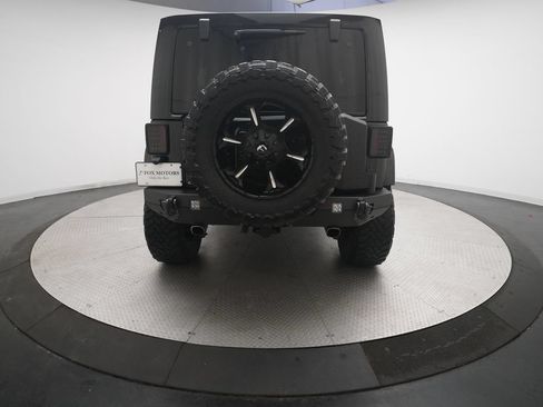 Used 2014 Jeep Wrangler Unlimited Rubicon w/ Dual Top Group AWD/4WD image 24