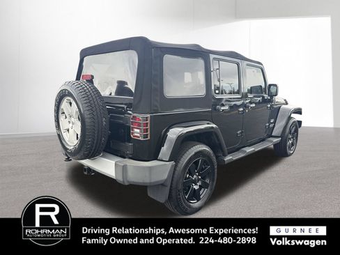 Used 2011 Jeep Wrangler Unlimited Sahara w/ Dual Top Group AWD/4WD image 9