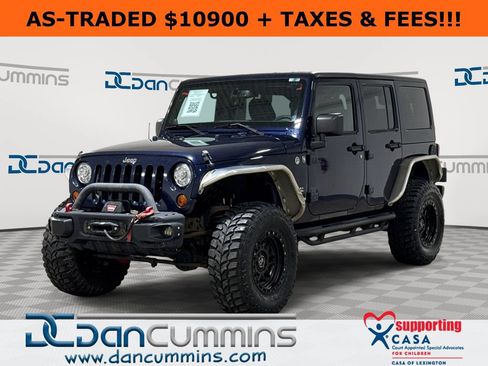 Used 2013 Jeep Wrangler Unlimited Sahara w/ Dual Top Group AWD/4WD image 1