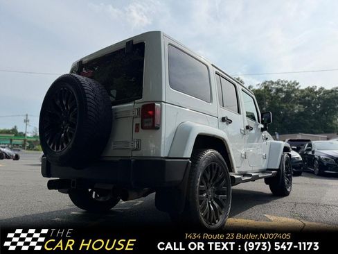 Used 2013 Jeep Wrangler Unlimited Sahara w/ Dual Top Group AWD/4WD image 4