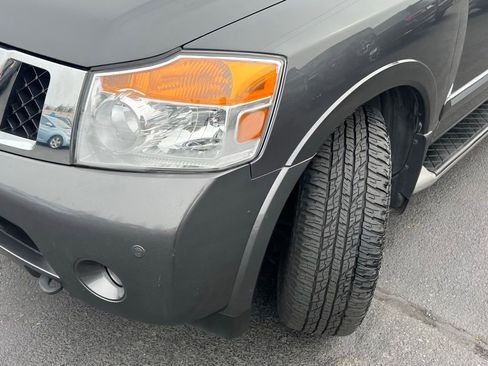 Used 2011 Nissan Armada Platinum w/ 2nd Row Captain Seat Pkg image 3