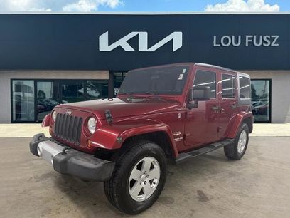 Used 2012 Jeep Wrangler Unlimited Sahara w/ Dual Top Group