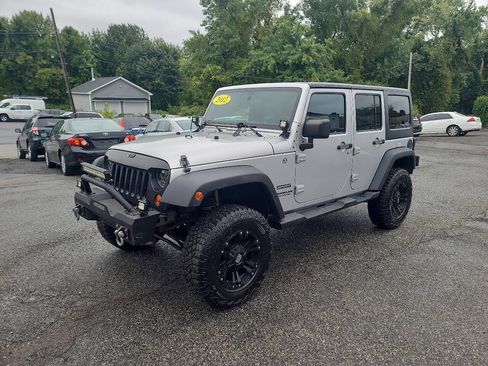Used 2012 Jeep Wrangler Unlimited Sport w/ Dual Top Group AWD/4WD image 4