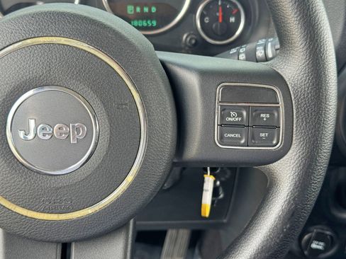 Used 2013 Jeep Wrangler Unlimited Sport w/ Mopar Black Appearance Group image 19