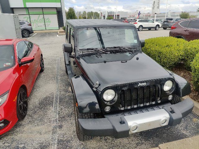 Used 2014 Jeep Wrangler Unlimited Sahara w/ Dual Top Group AWD/4WD image 19