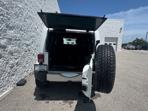 Used 2014 Jeep Wrangler Unlimited Sahara w/ Mopar Chrome Edition Group AWD/4WD image 3