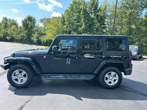 Used 2014 Jeep Wrangler Unlimited Sahara w/ Max Tow Package AWD/4WD image 4