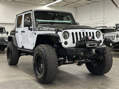 Used 2014 Jeep Wrangler Unlimited Rubicon w/ Max Tow Package AWD/4WD image 1