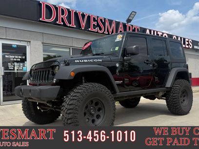 Used 2014 Jeep Wrangler Unlimited Rubicon w/ Dual Top Group