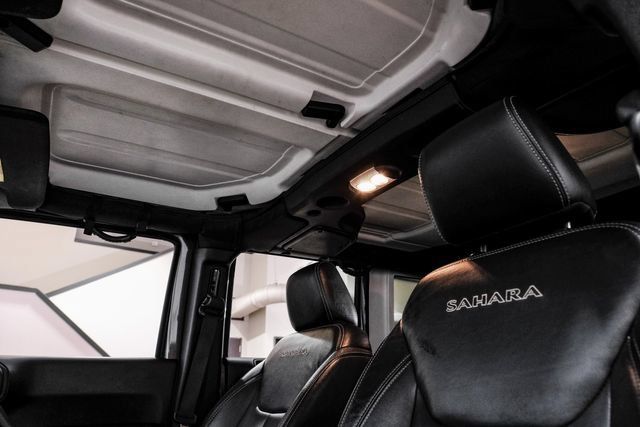 Used 2016 Jeep Wrangler Unlimited Sahara w/ Dual Top Group AWD/4WD image 35