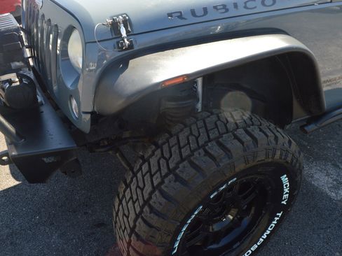 Used 2014 Jeep Wrangler Unlimited Rubicon w/ Dual Top Group AWD/4WD image 4