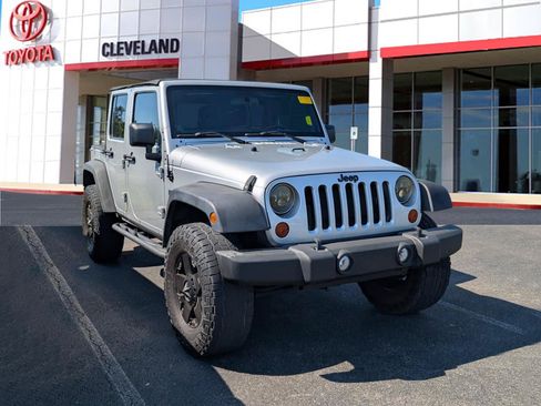 Used 2012 Jeep Wrangler Unlimited Sport w/ Connectivity Group AWD/4WD image 2