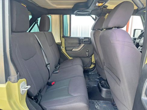 Used 2013 Jeep Wrangler Unlimited Sport w/ Mopar Black Appearance Group image 31