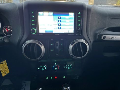 Used 2012 Jeep Wrangler Unlimited Sahara w/ Dual Top Group AWD/4WD image 10