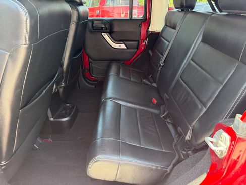 Used 2012 Jeep Wrangler Unlimited Sahara w/ Dual Top Group AWD/4WD image 13