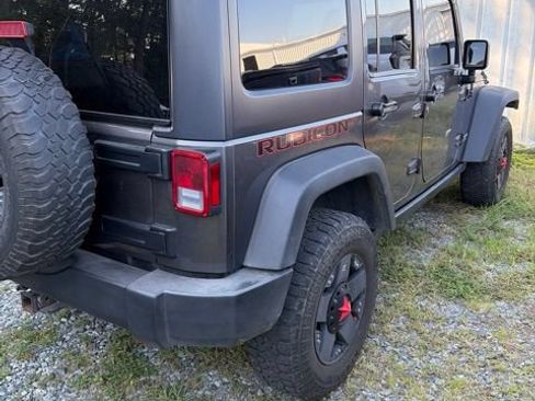 Used 2014 Jeep Wrangler Unlimited Rubicon w/ Dual Top Group AWD/4WD image 9