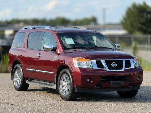 Used 2011 Nissan Armada Platinum w/ 2nd Row Captain Seat Pkg RWD image 1