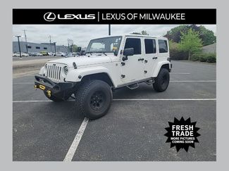 Used 2012 Jeep Wrangler Unlimited Sahara w/ Dual Top Group AWD/4WD video 1