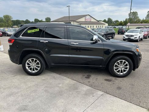 Used 2014 Jeep Grand Cherokee Overland w/ Mopar Chrome Edition Group AWD/4WD image 4