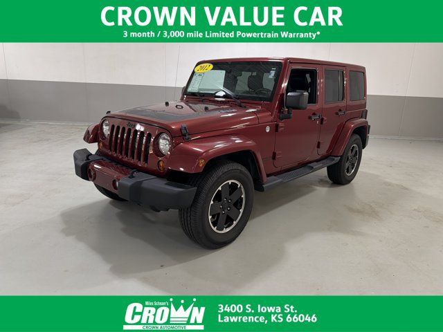 Used 2012 Jeep Wrangler Unlimited Sahara AWD/4WD image 1