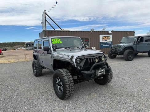 Used 2014 Jeep Wrangler Unlimited Sport image 1