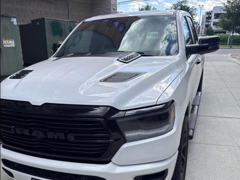 Used 2024 RAM 1500 Laramie AWD/4WD image 1