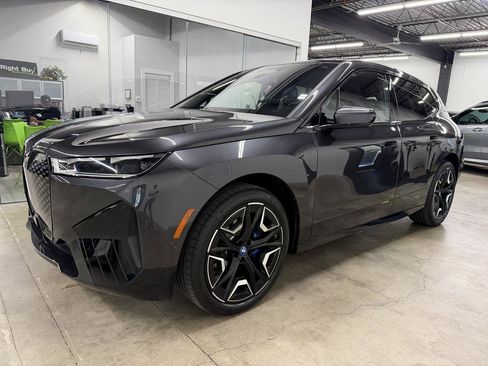 Used 2024 BMW iX xDrive50 w/ Premium Package AWD/4WD image 1