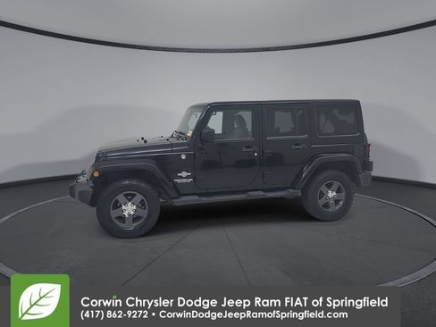Used 2011 Jeep Wrangler Unlimited Sport w/ Connectivity Group AWD/4WD image 8