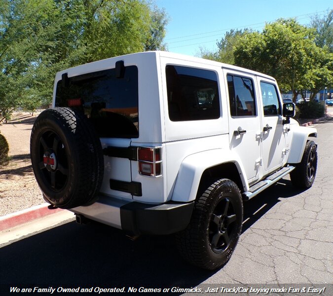 Used 2012 Jeep Wrangler Unlimited Sahara w/ Dual Top Group AWD/4WD image 8