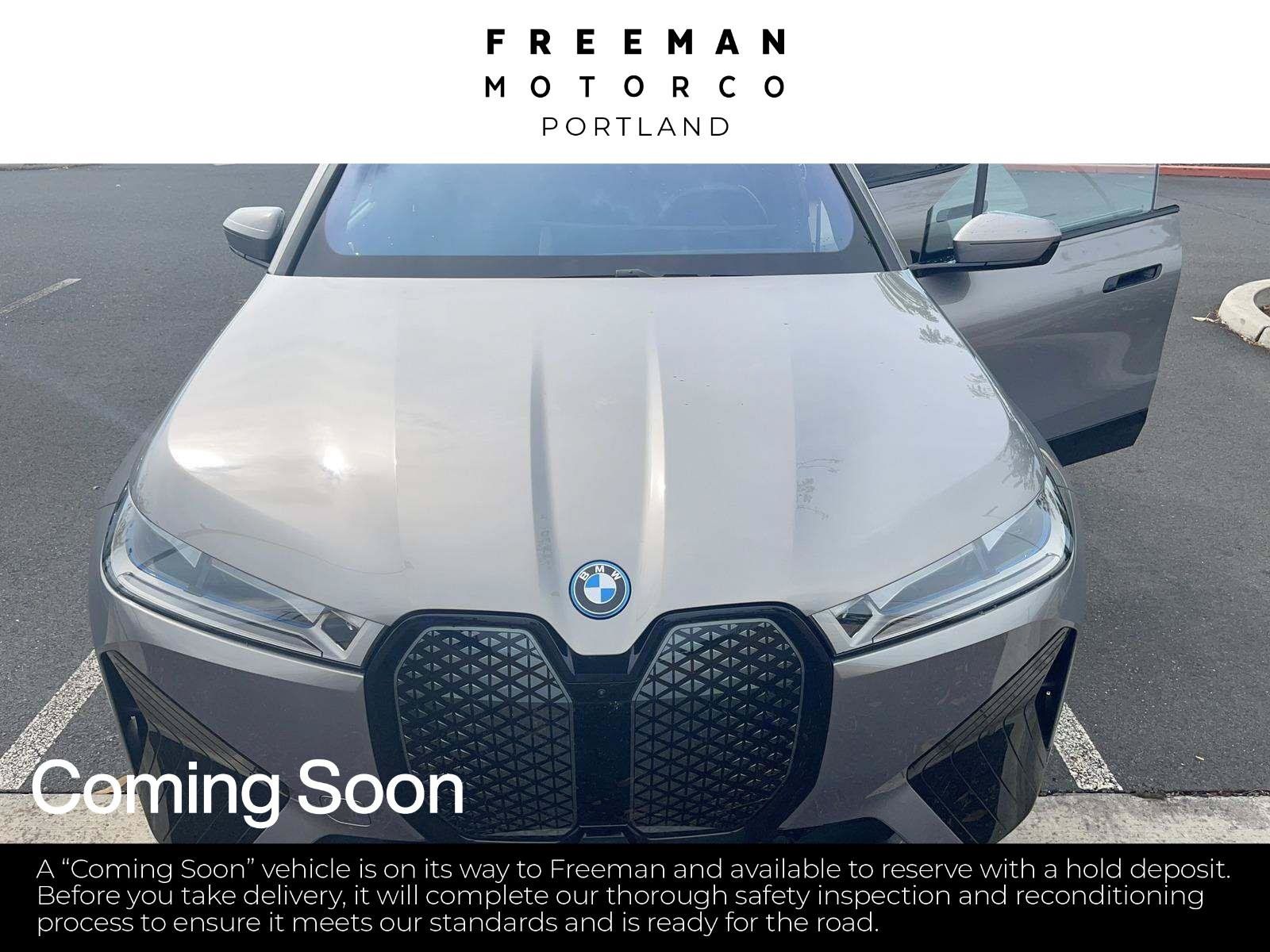 Used 2024 BMW iX xDrive50 w/ Premium Package AWD/4WD image 1