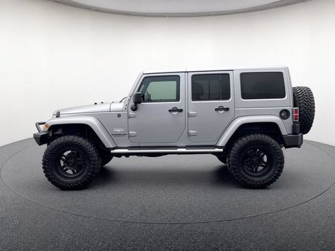 Used 2014 Jeep Wrangler Unlimited Sahara w/ Mopar Chrome Edition Group AWD/4WD image 2