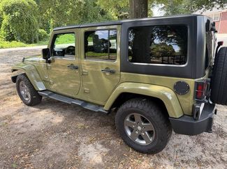 Used 2013 Jeep Wrangler Unlimited Sport AWD/4WD video 2