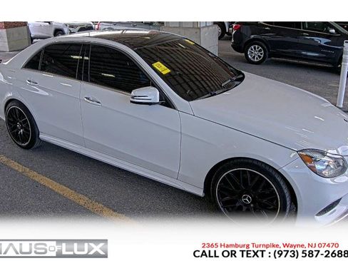 Used 2015 Mercedes-Benz E 400 4MATIC Sedan w/ Keyless Go Package image 1