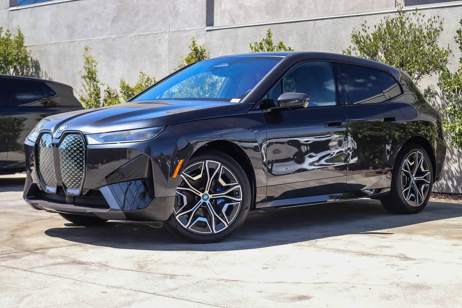 Used 2025 BMW iX xDrive50 w/ Premium Package AWD/4WD image 1