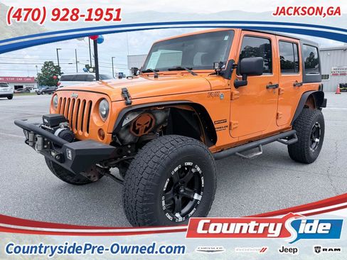 Used 2012 Jeep Wrangler Unlimited Sport AWD/4WD image 1